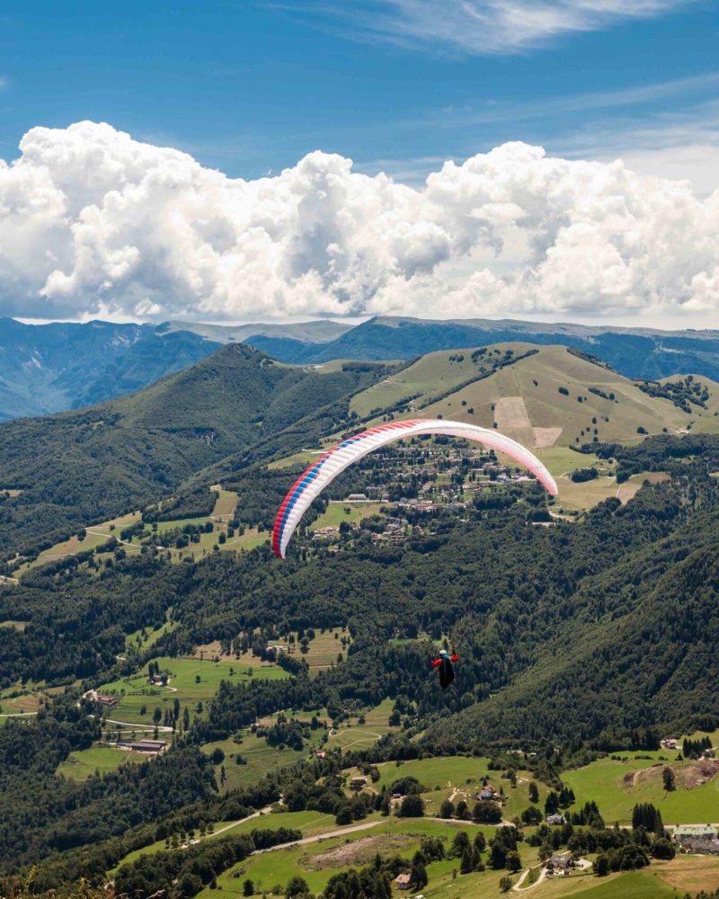 Paragliding in the sky over the dolomites