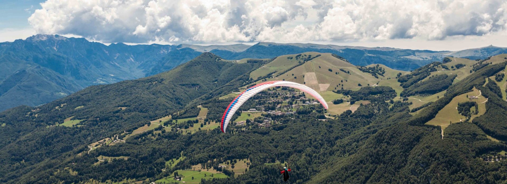 Paragliding in the sky over the dolomites