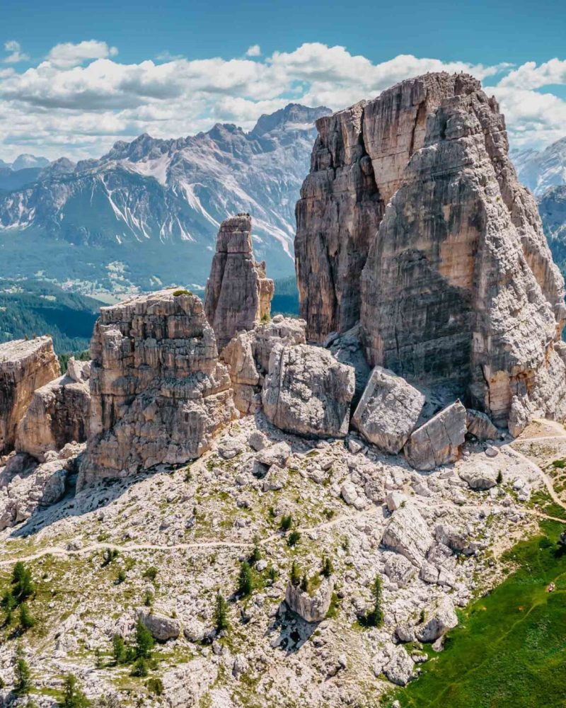 Climbing in Cinque Torri,Dolomites,Italy.Five towers and rock formations close to Cortina d'Ampezzo attract many tourists.Picturesque Dolomite Alps,active summer holiday,steep cliffs.Adventure concept