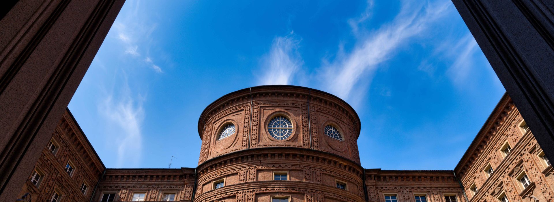 A historical building in the centre of Turin famous for its rounded façade
