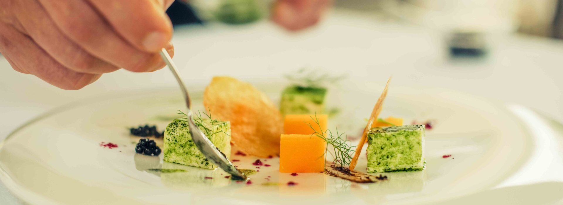 close-up-man-preparing-food-plate